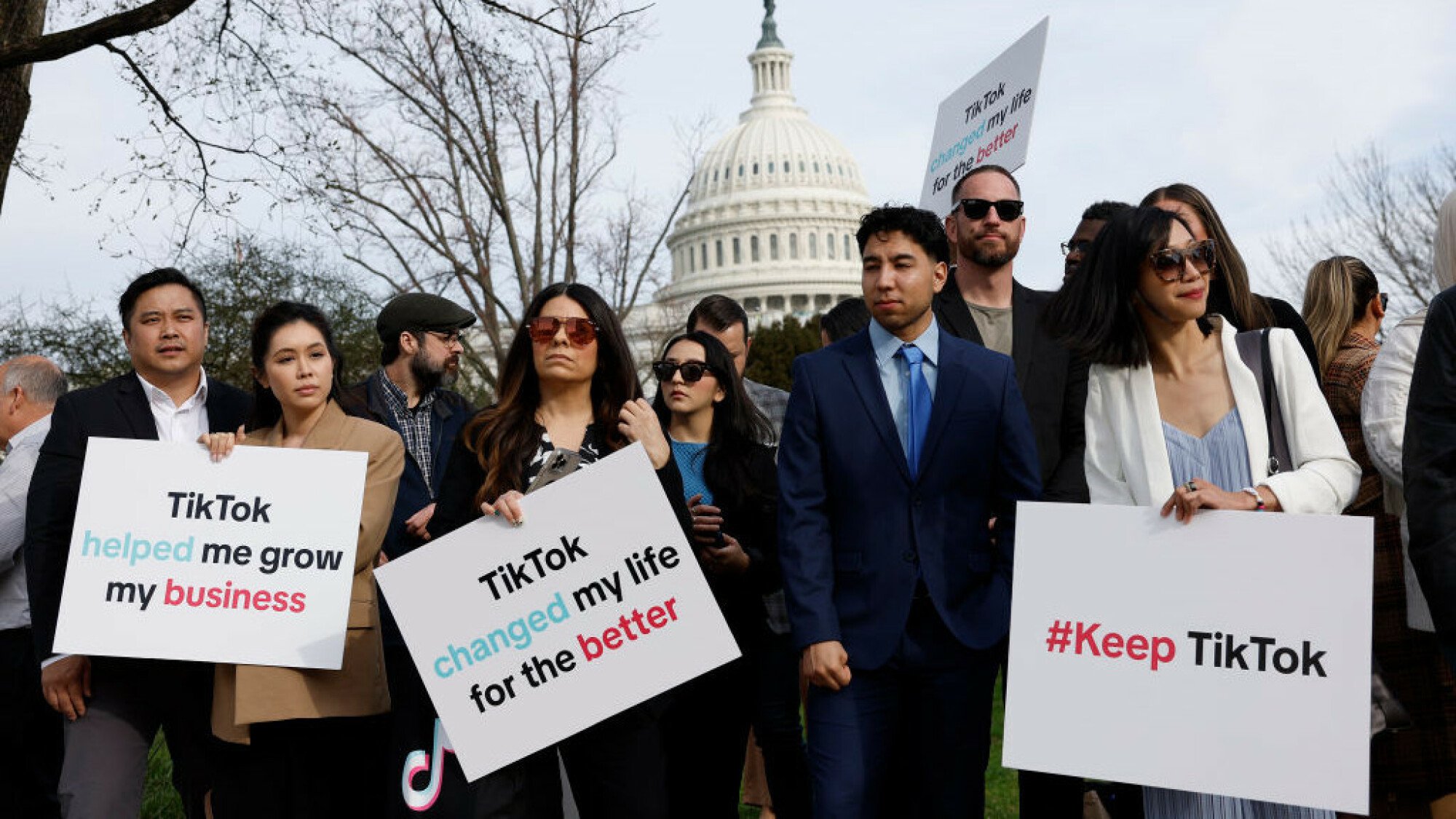 Protestors hold signs in support of TikTok outside the U.S. Capitol Building on March 13, 2024 in Washington, DC.